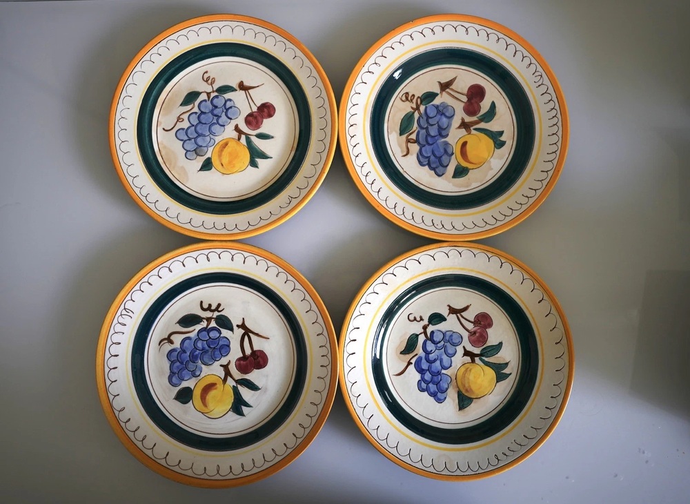 Four Stangl Fruit plates with hand-painted grapes, pears and cherries