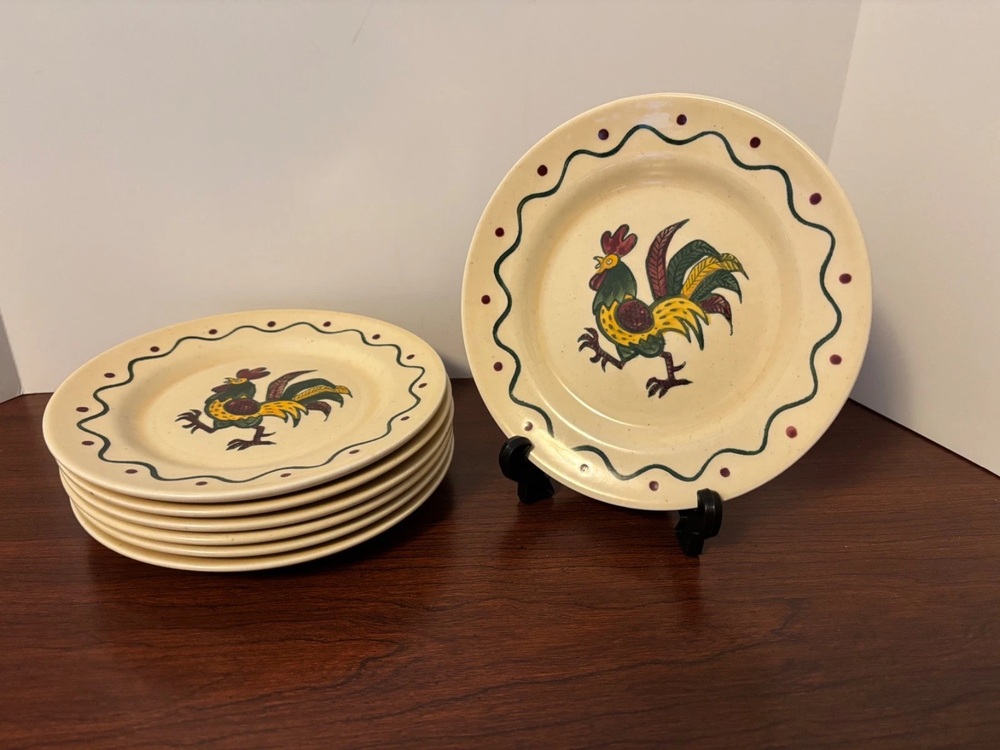 Metlox California Provincial rooster plates arranged in a stack and on a stand