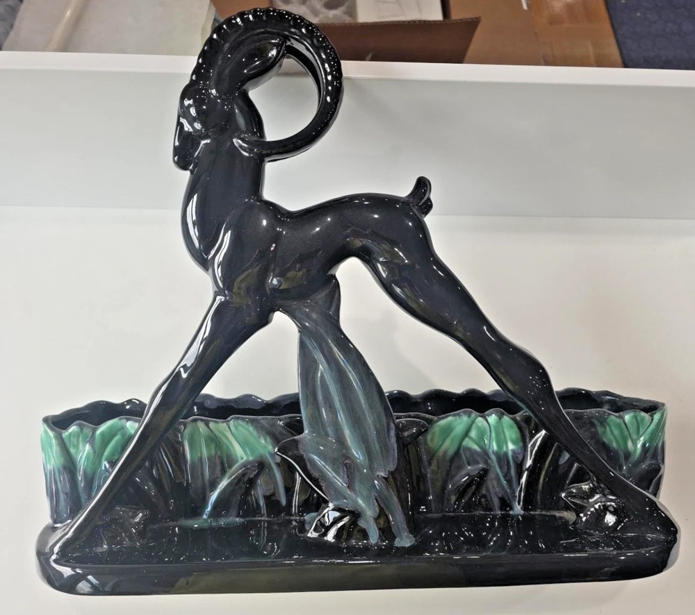 Royal Haeger leaping gazelle planter in black and green glaze