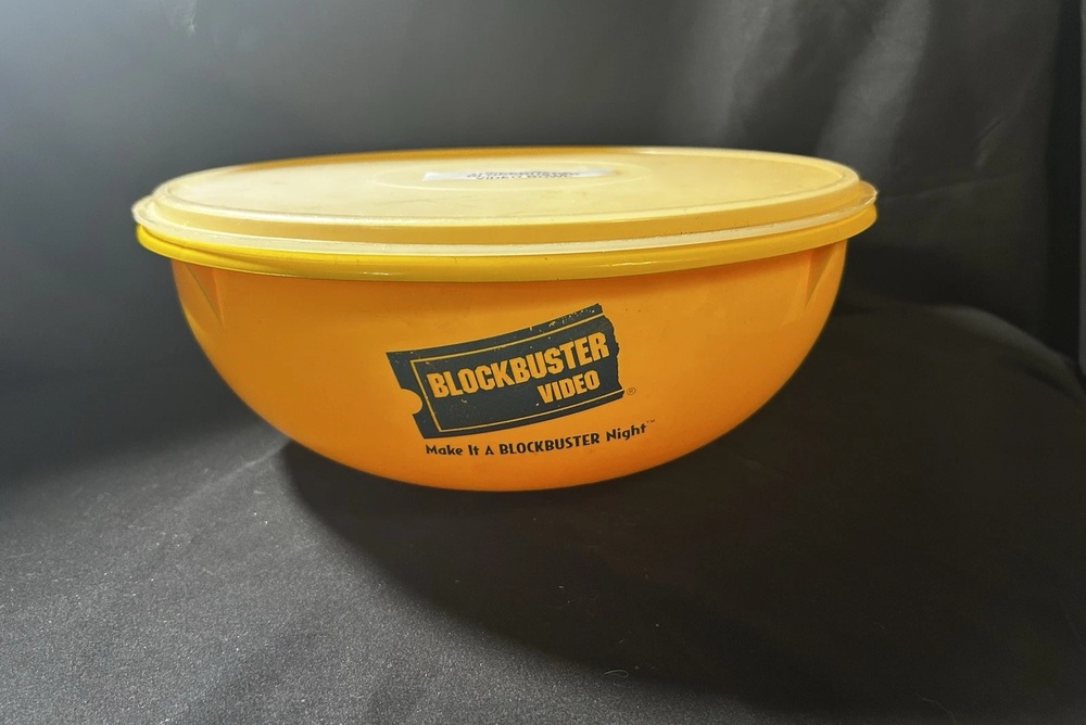 Yellow Tupperware Blockbuster Video popcorn bowl with lid
