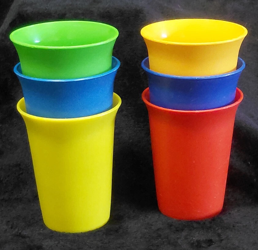 Six colorful Tupperware Bell tumblers in two stacks