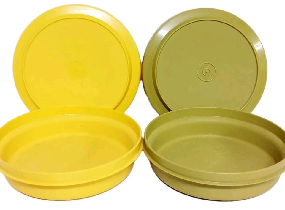 Yellow and avocado green Tupperware bowls with matching lids